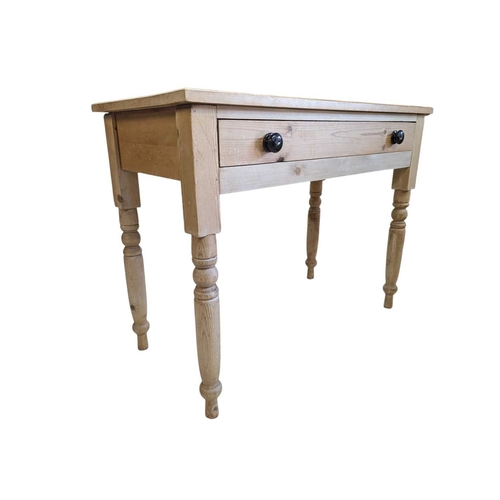 A 19th century Victorian pine writing desk. The desk having ...