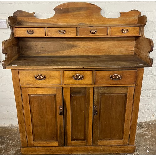 Pine Scotch dresser with four spice drawers over three friez...