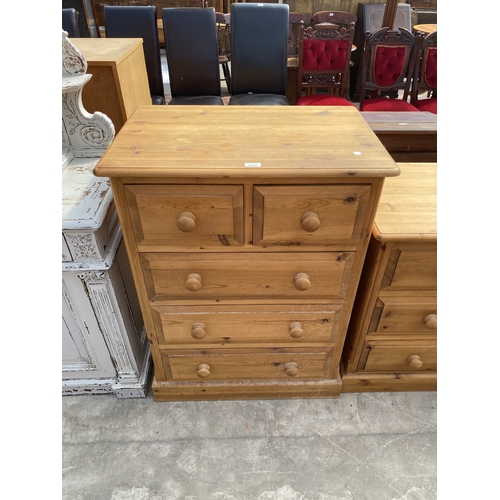A VICTORIAN STYLE PINE CHEST OF TWO SHORT AND THREE LONG DRA...