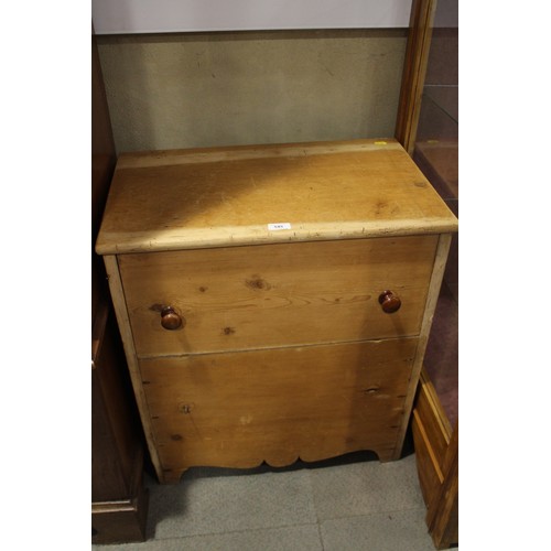 A waxed pine commode with lift up lid and liner, on bracket ...