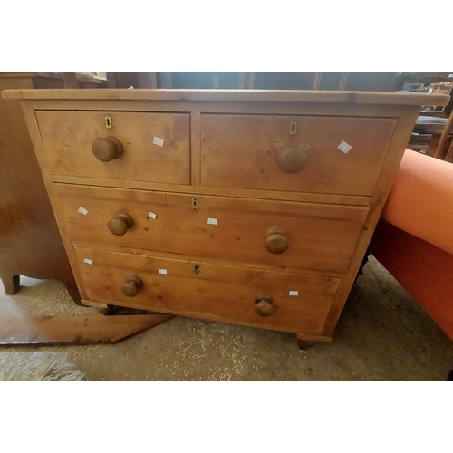 A 91cm Victorian pine chest of four drawers, set on onion sh...