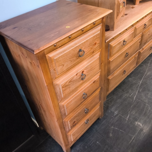 A pine seven piece bedroom suite