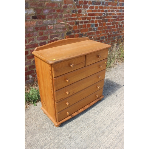 A pine serpentine fronted and ledge back chest of two short ...