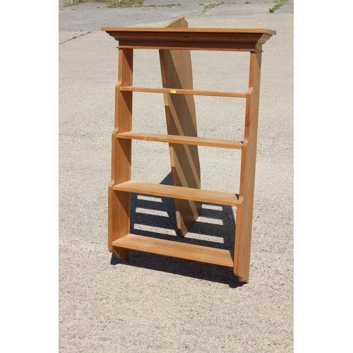 A waxed pine waterfall four-tier open hanging wall shelf, 29...