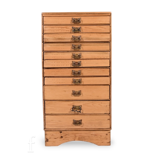 A late 19th to early 20th Century pine collectors cabinet in...