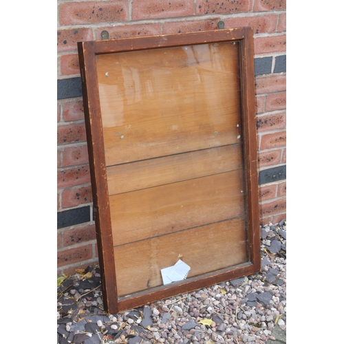 A railway station wall mounted display cabinet as used for p...