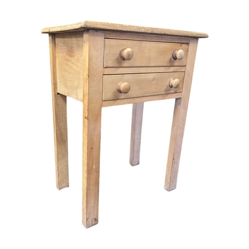 A 20th century Victorian provincial pine bedside table. The ...