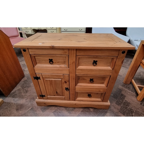 A pine side cabinet fitted three drawers and cupboards, 3' w...