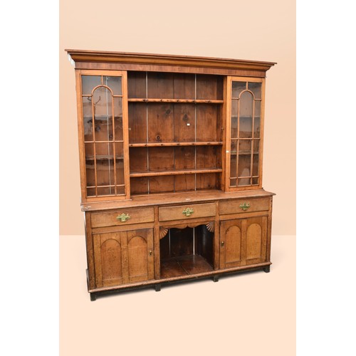 George III oak and pine dresser with three plate racks flank...