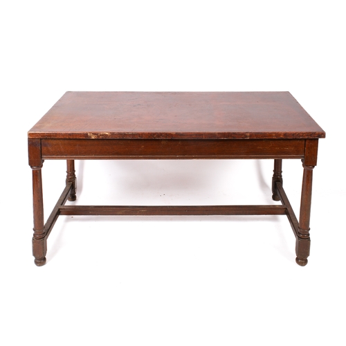 An oak and pine rectangular kitchen or dining table with two...