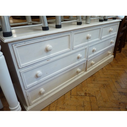 Painted pine 7 drawer chest ( approx 66" long)