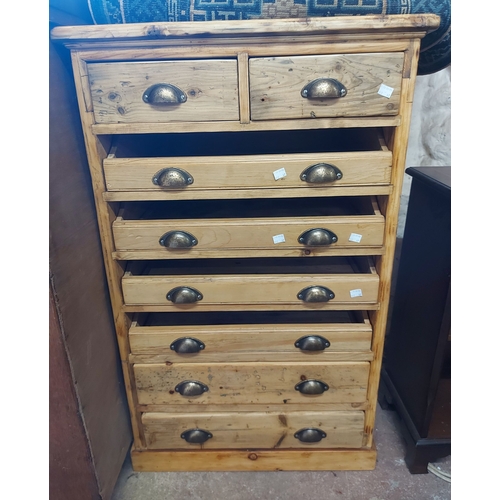 A 65cm handmade reclaimed pine cabinet with four slides over...