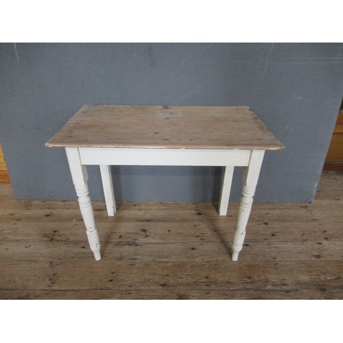 A pine sidetable, on painted base, 35ins x 20ins, height 28i...