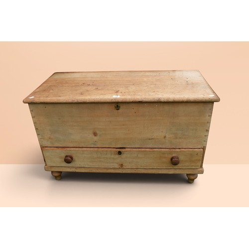 A mid-19th century pine mule chest with lift-up top, and sin...