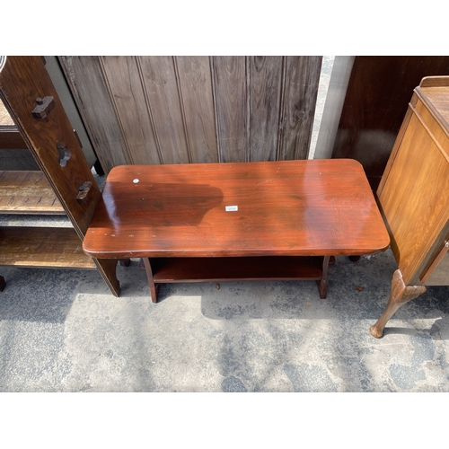 A STAINED PINE TWO TIER COFFEE TABLE
