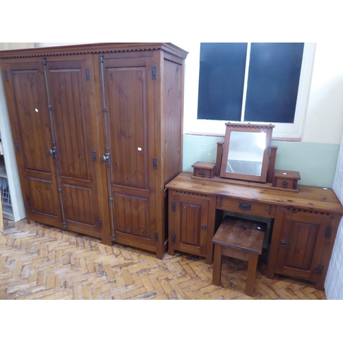 Gothic or Tudor style pine 3 door wardrobe, dressing table a...