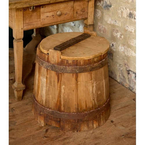 A COOPERED PINE STORAGE BARREL AND COVER A COOPERED PINE STO...