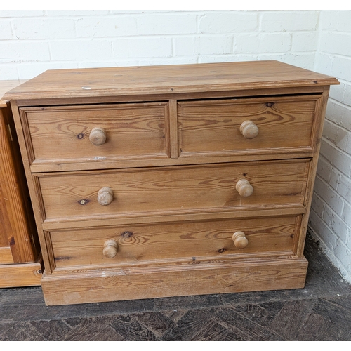 A waxed reclaimed  pine chest of two long and two short draw...