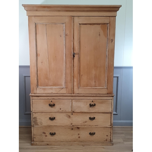 A 19th century pine Linen Press with pair of solid panelled ...
