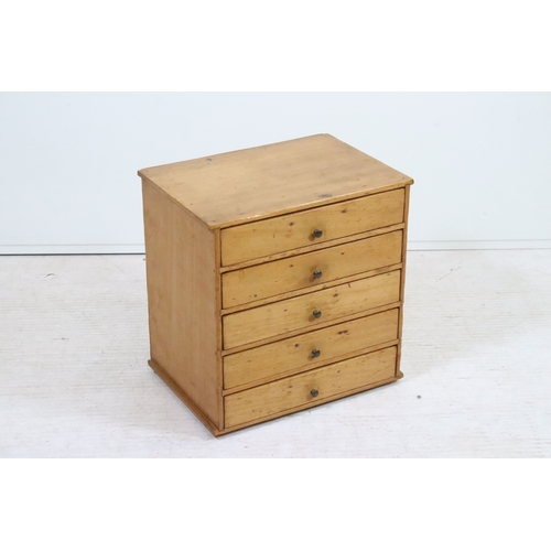 20th century pine table top chest of drawers, having five lo...