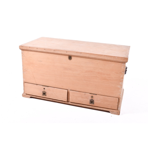 A Victorian pine mule chest. Having two drawers below and a ...