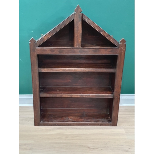 A set of stained pine and oak Wall Shelves, possibly to disp...