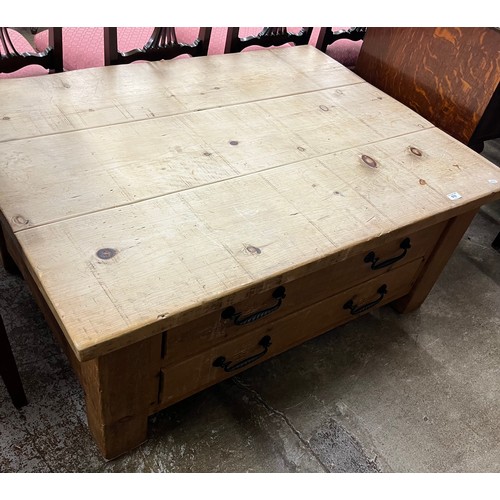 Pine coffee table fitted two base drawers.