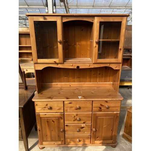 A PINE DRESSER WITH PARTIALLY GLAZED UPPER PORTION, 46" WIDE