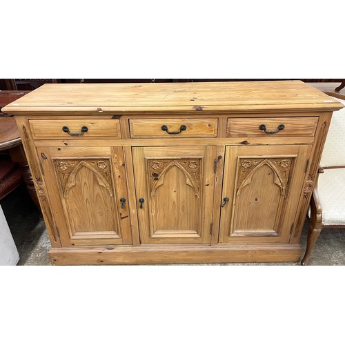 Pine sideboard with carved ends, fitted three frieze drawers...