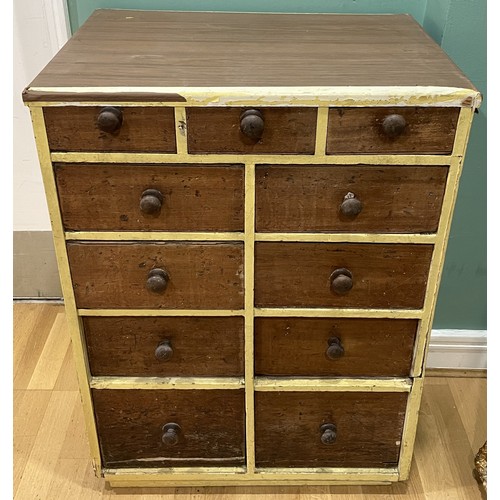 A late 19th century painted pine bank of drawers, three shor...