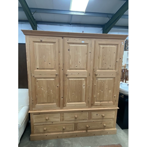 Pine three door/five drawer wardrobe 194H 170W 55D