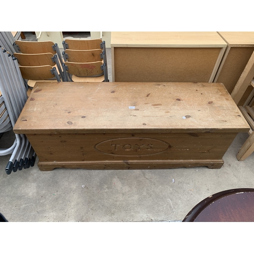 A PINE TOY CHEST, 54" X 18"