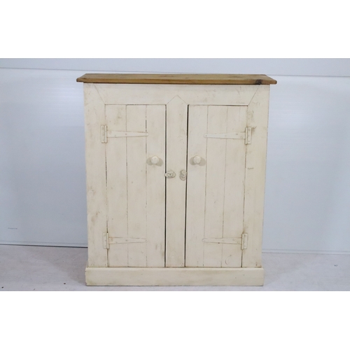 20th century painted pine storage cupboard, having two doors...