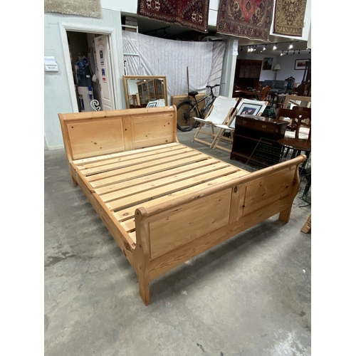 Pine king size sleigh bed with side rails and lats