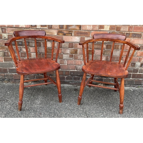 A PAIR OF PINE G.T.E LONDON BOW CAPTAIN’S ARMCHAIRS, SPINDEL...