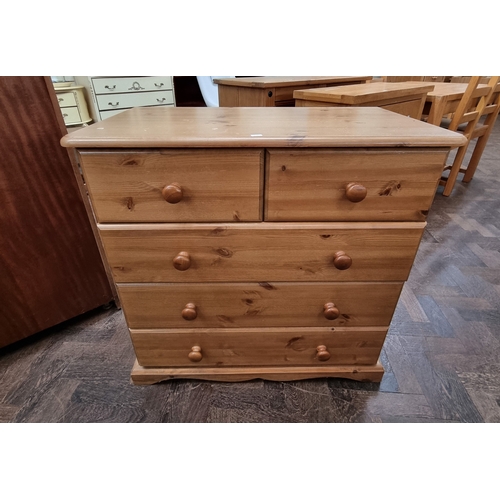 A Victorian style pine chest of three long and two short dra...