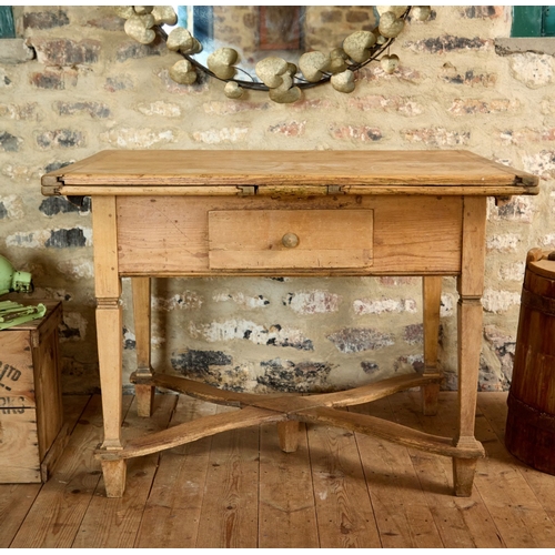 A CONTINENTAL PINE DRAW-LEAF TABLE A CONTINENTAL PINE DRAW-L...