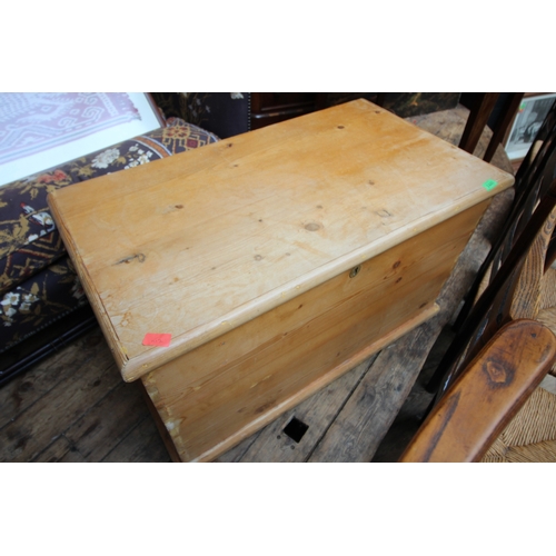 Nicely proportioned pine chest with top opener and candlebox...