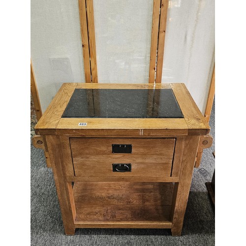 Large chunky solid light oak butchers block table with a bla...