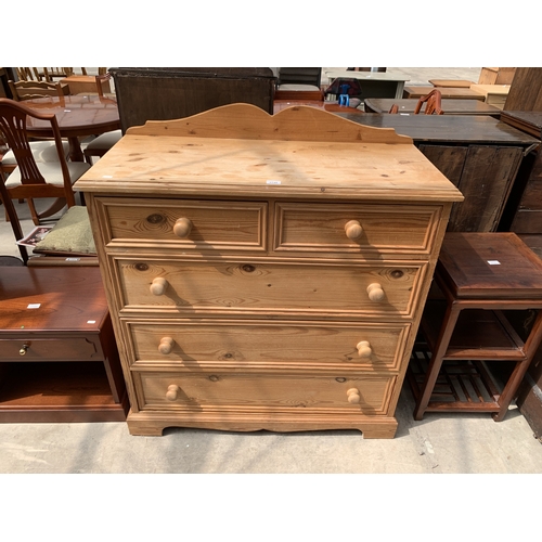 A VICTORIAN STYLE PINE CHEST OF TWO SHORT AND THREE LONG DRA...