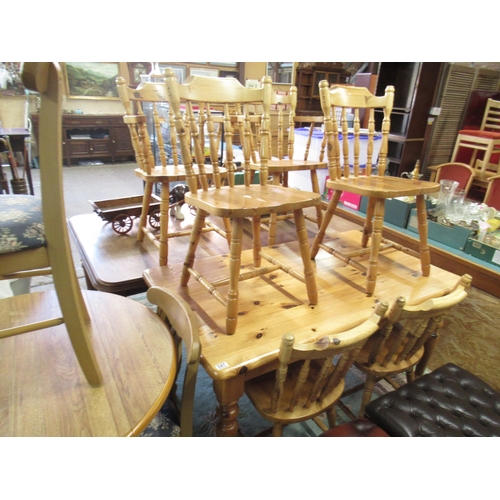 Pine table and 6 chairs.
