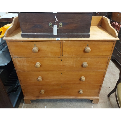 A 1.1m Victorian pine chest of five drawers with shaped gall...