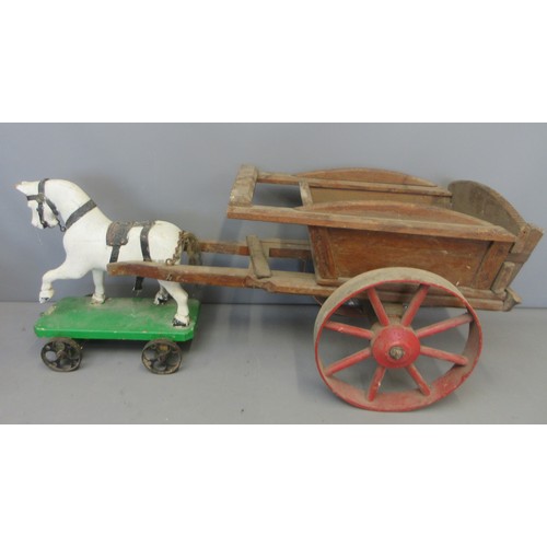 A charming late 19th Century painted wooden horse and cart, ...