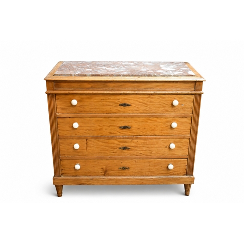 A 19th century pine chest of drawers with a marble top. Havi...