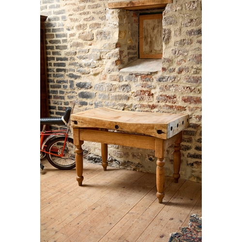 A VINTAGE BUTCHER'S BLOCK A VINTAGE BUTCHER'S BLOCK  c.1900,...