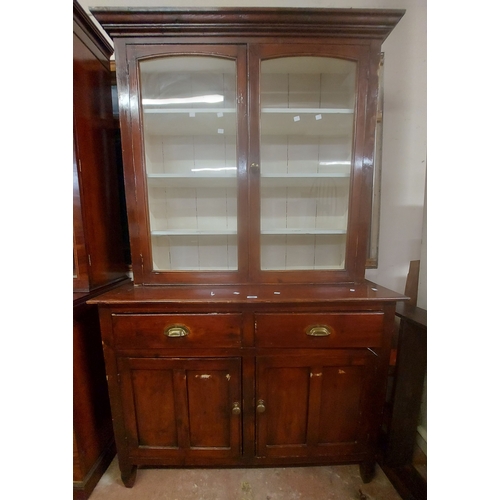 A 1.22m Victorian stained pine two part dresser with glazed ...