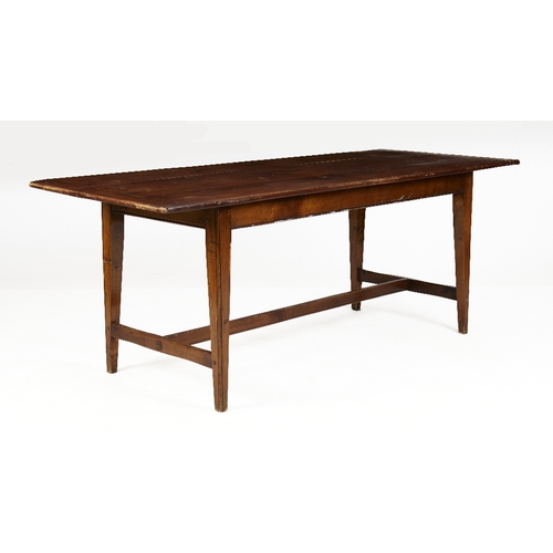 A French stained pine refectory table, second quarter 20th c...