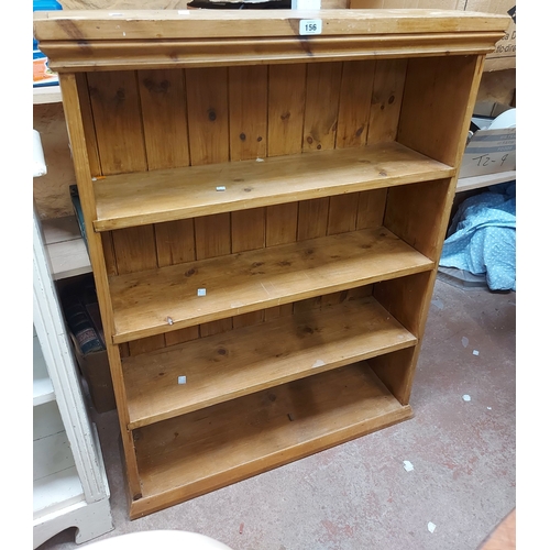 An 82cm late 20th Century pine bookcase with three fixed she...