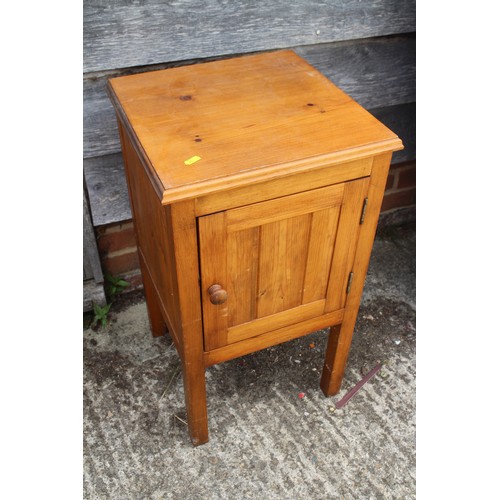 A pine bedside cupboard enclosed single door, 15" wide x 15"...
